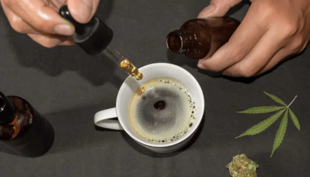 pouring-cbd-tincture-coffee-cup-600nw-1520603123.jpg