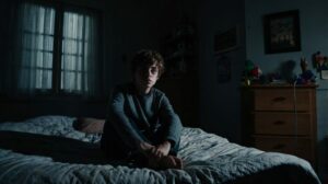 Leonardo_Kino_XL_mad_student_sitting_on_his_bed_big_eyes_a_sha_3